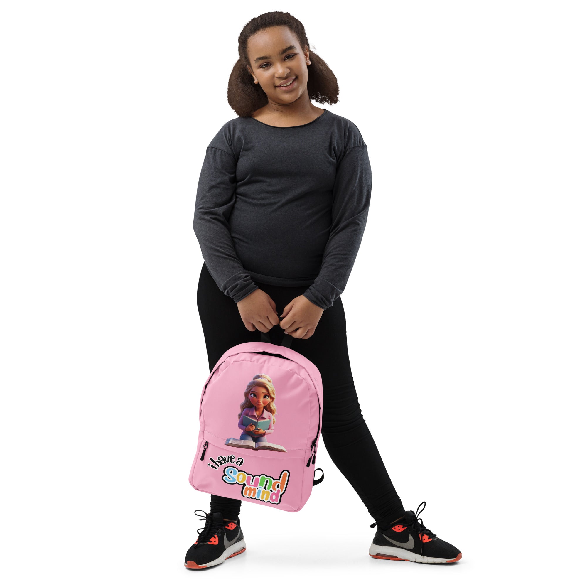 Pink backpack with all-over print featuring a "I Have A Sound Mind" design for kids from Kingdom Kids Club.