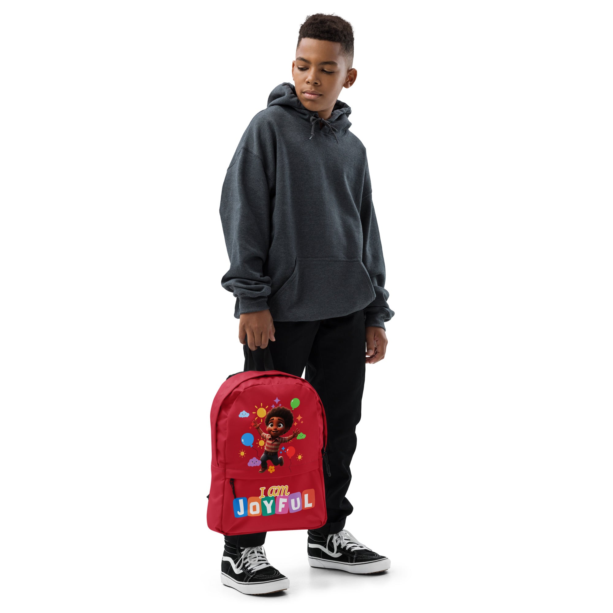 Kingdom Kids Club I Am Joyful red backpack with all-over white print, featuring adjustable straps and front pocket design.