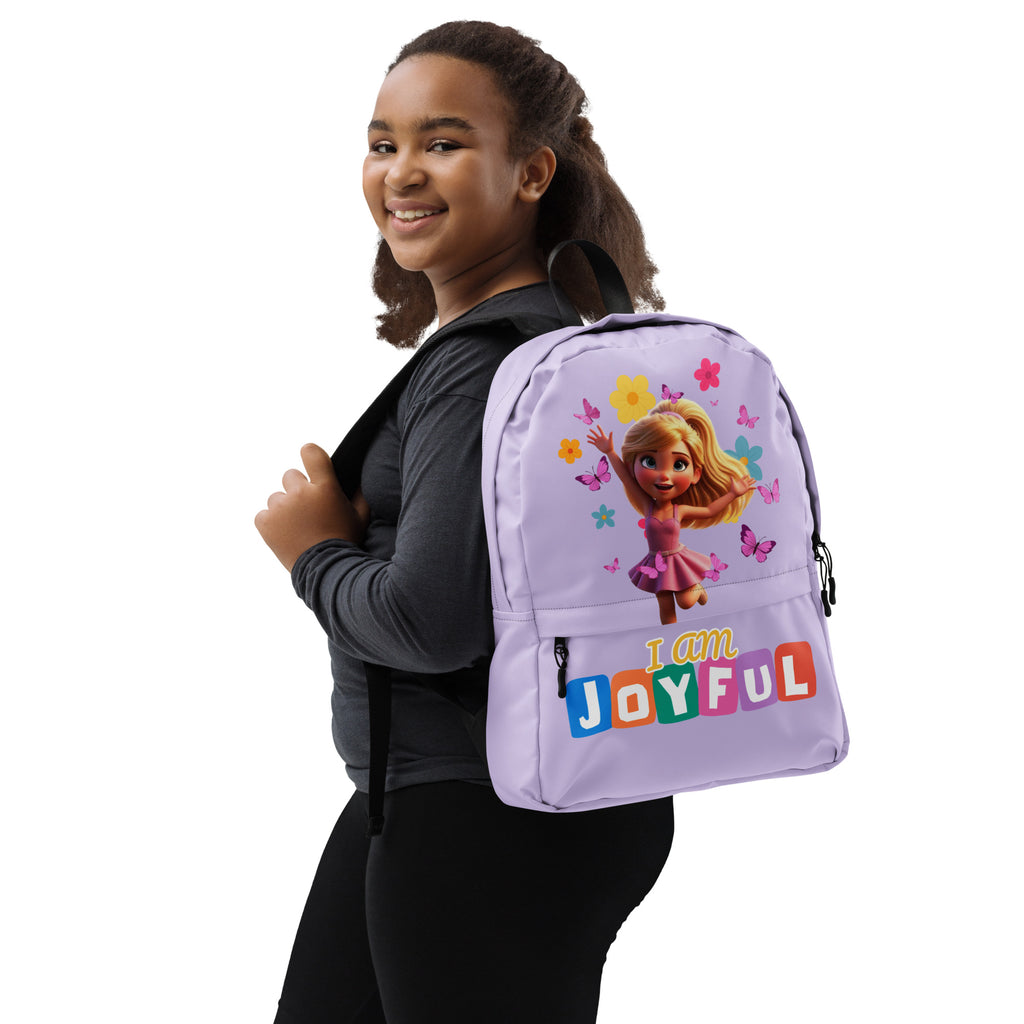 Purple backpack with colorful print design from Kingdom Kids Club, featuring adjustable straps and multiple compartments.
