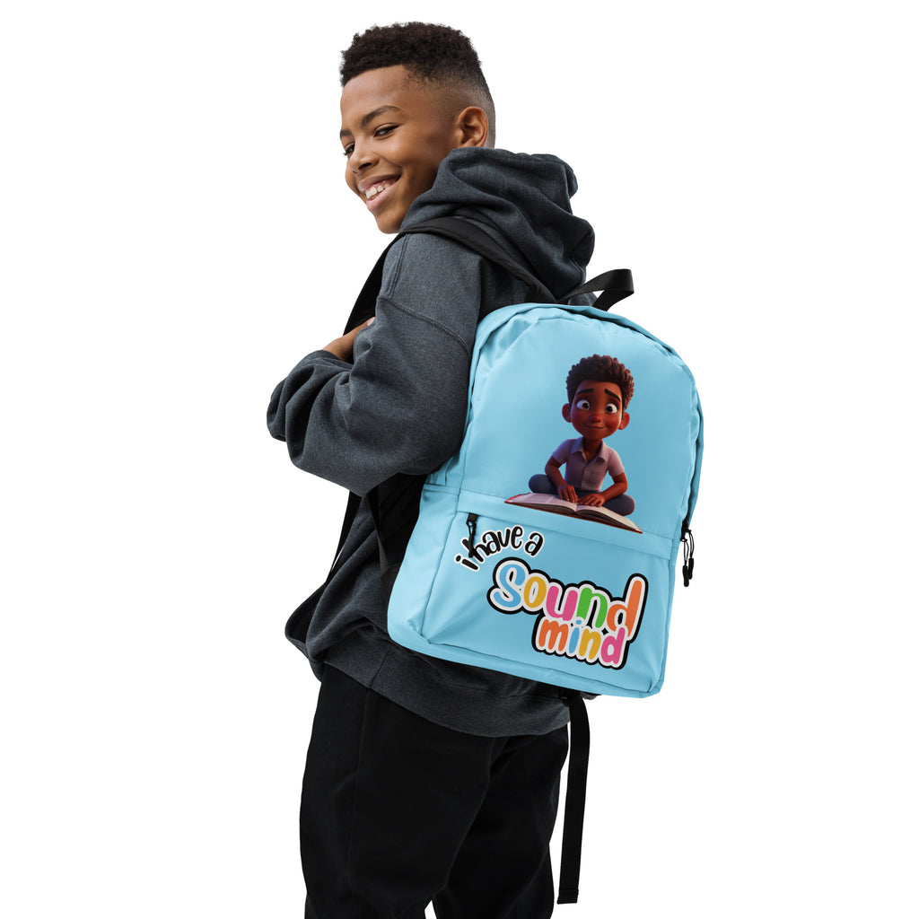 All-over print blue backpack with "I Have A Sound Mind" design by Kingdom Kids Club, shown from the right side.
