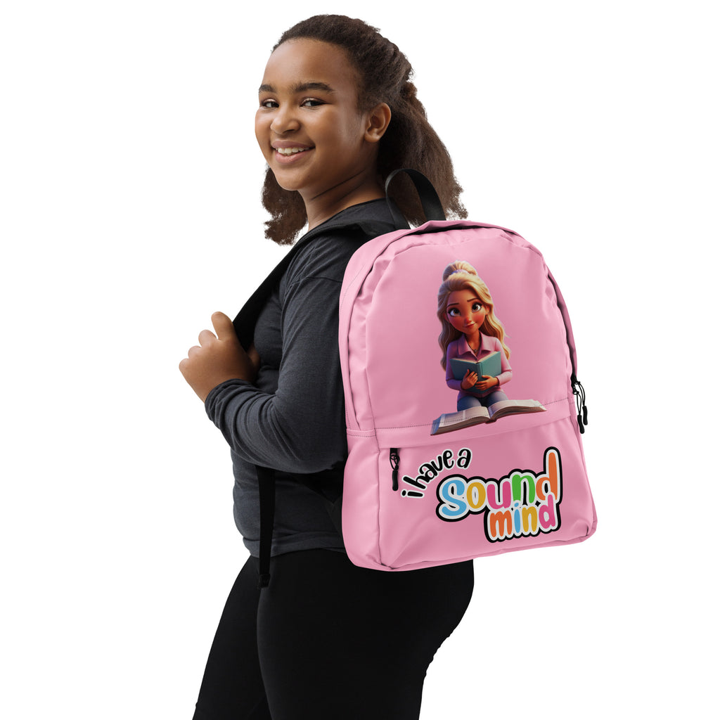 Pink backpack with all-over "I Have A Sound Mind" print, designed for kids by Kingdom Kids Club, featuring adjustable straps and a front pocket.
