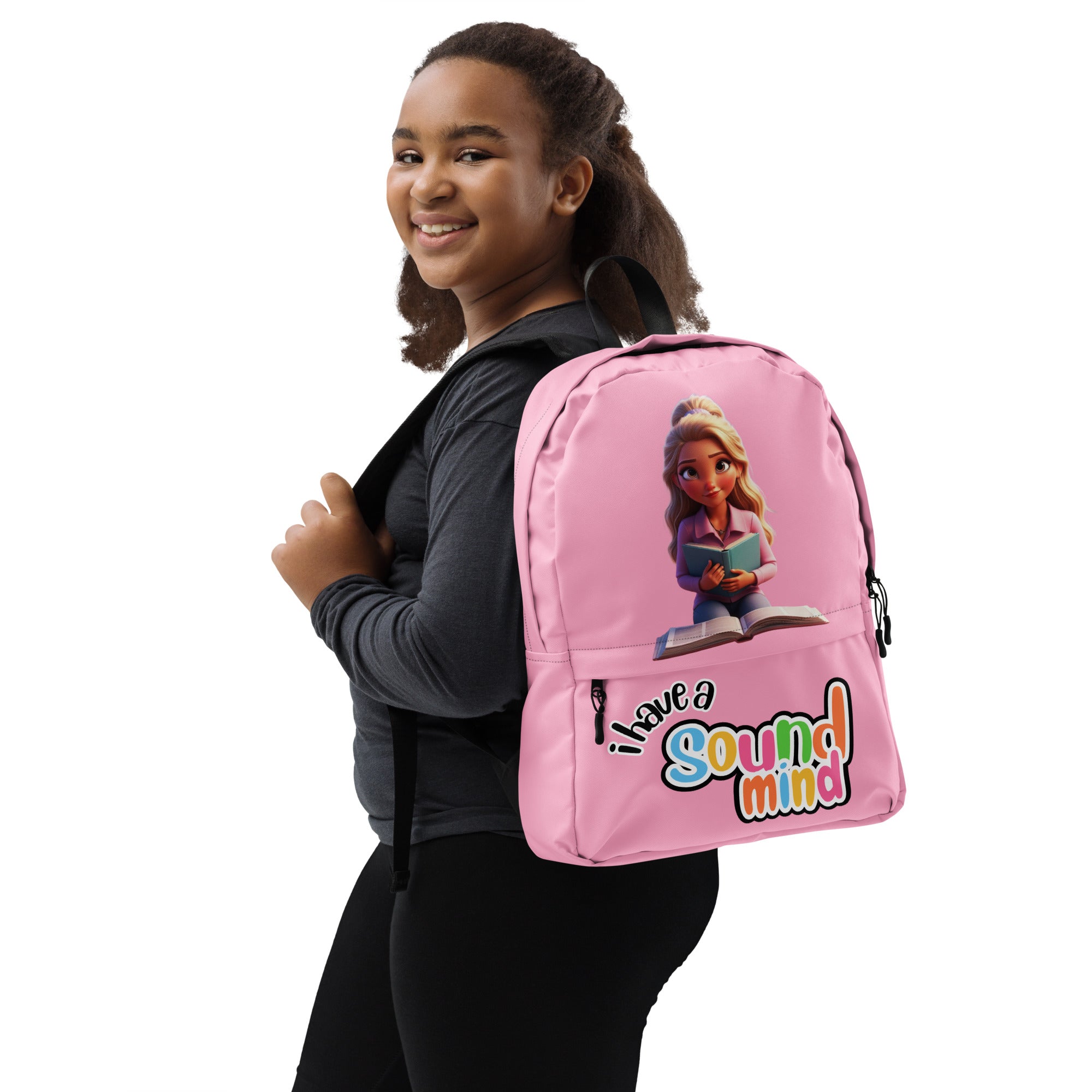 Pink backpack with all-over "I Have A Sound Mind" print, designed for kids by Kingdom Kids Club, featuring adjustable straps and a front pocket.