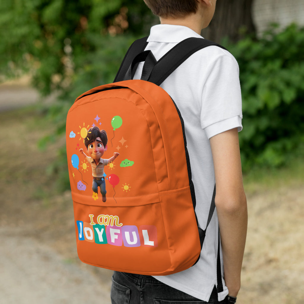All-over print orange backpack from Kingdom Kids Club with joyful design, shown from the right side.